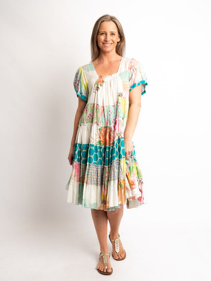 Cap sleeve knee length dress in mixed lime and pink prints