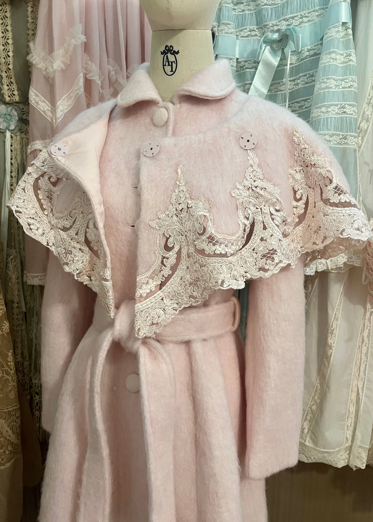 Pink frosting capelet coat