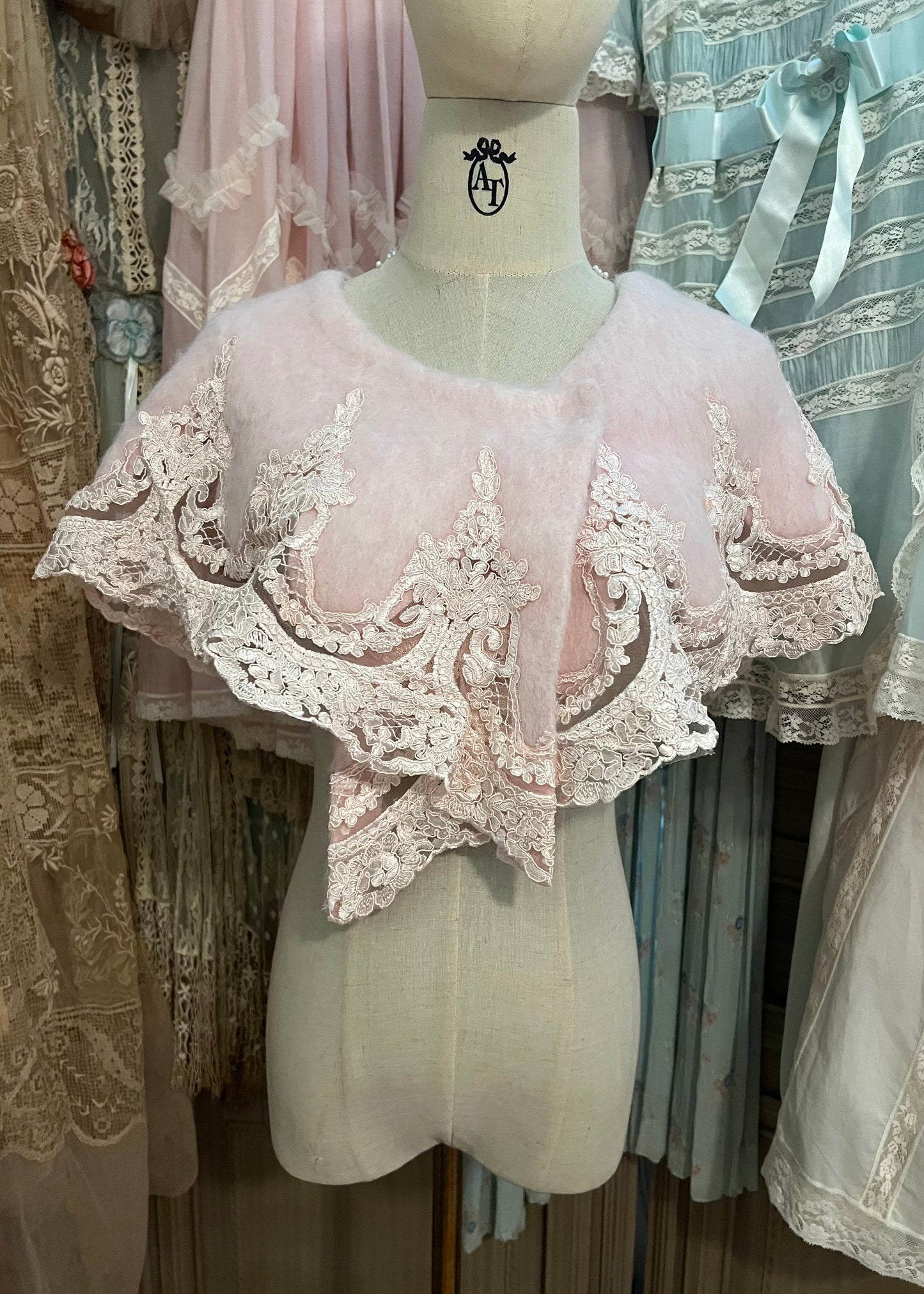 Pink frosting capelet coat