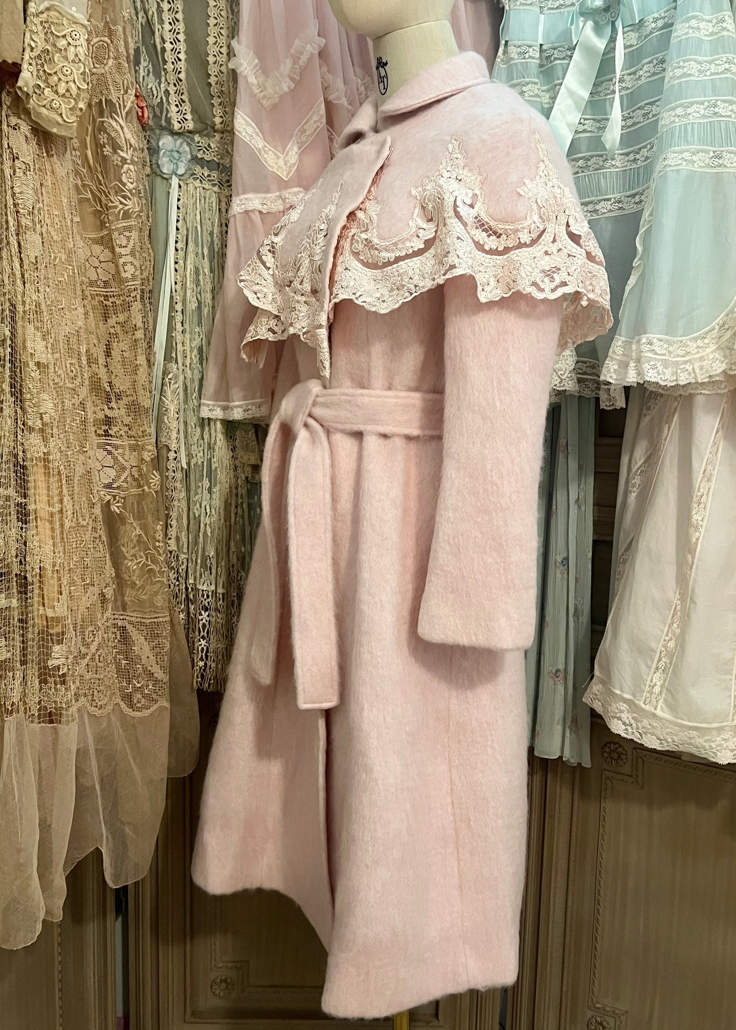 Pink frosting capelet coat