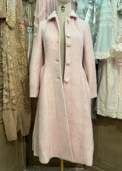 Pink frosting capelet coat