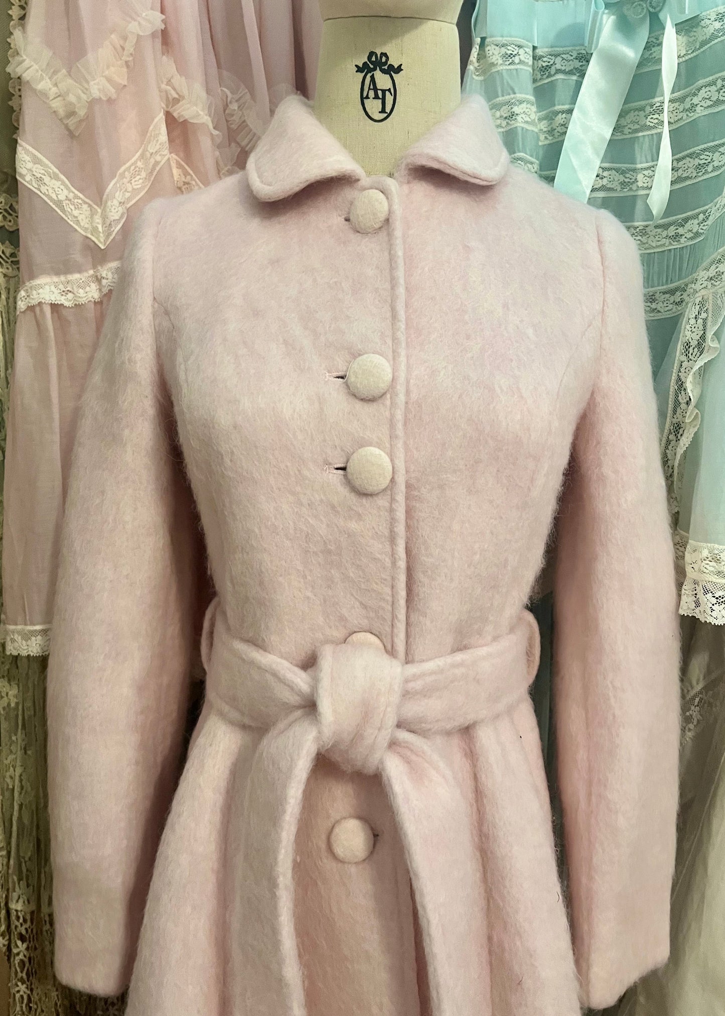 Pink frosting capelet coat