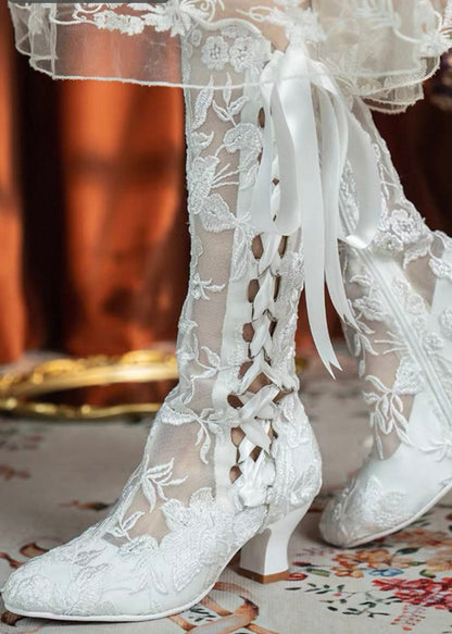 Lacey silhouette knee-high boots